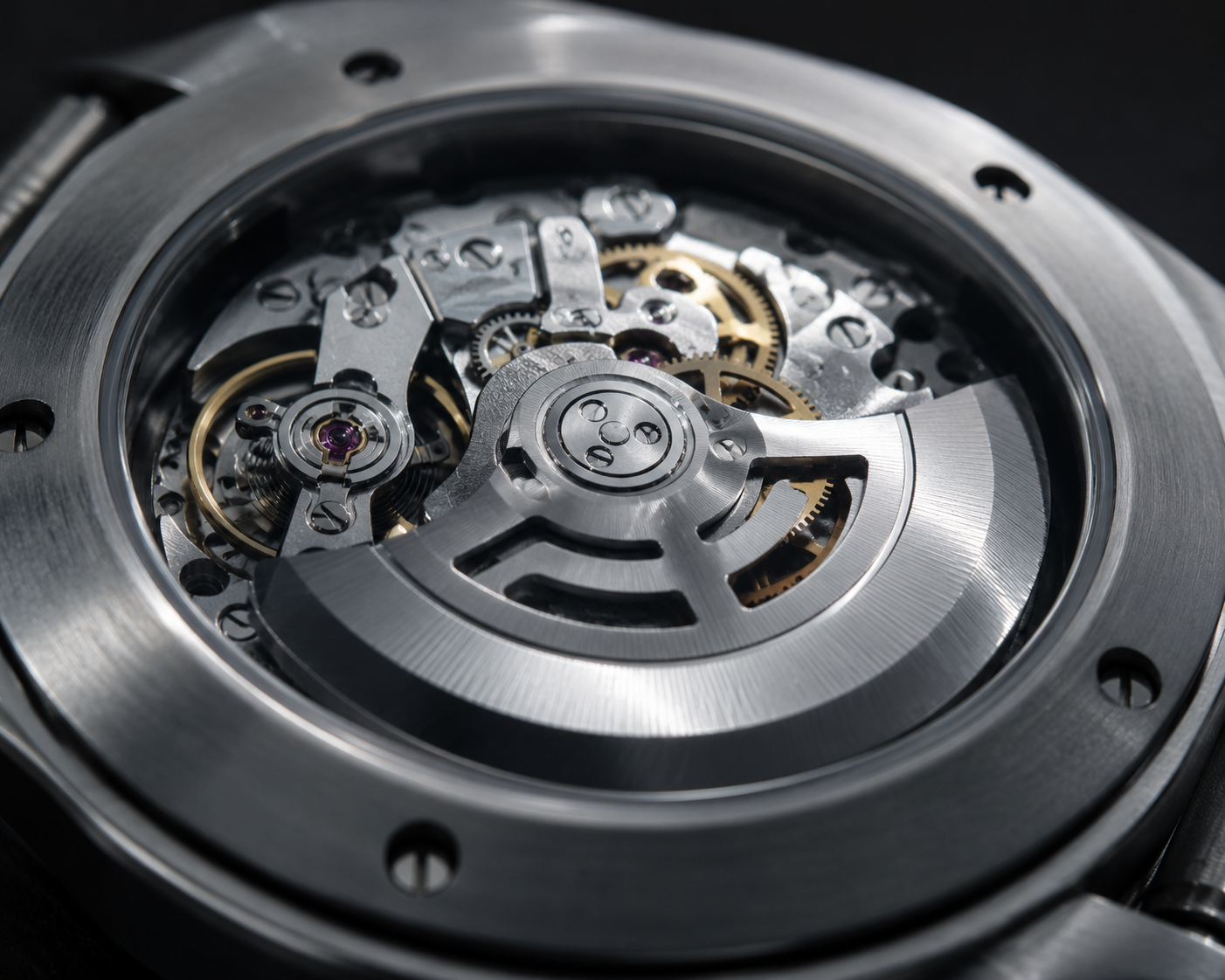 Automatic watch movement with visible rotor seen through transparent case back