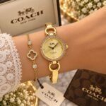 Coach Park Gold Tone Champagne Sunray Dial - Image 5