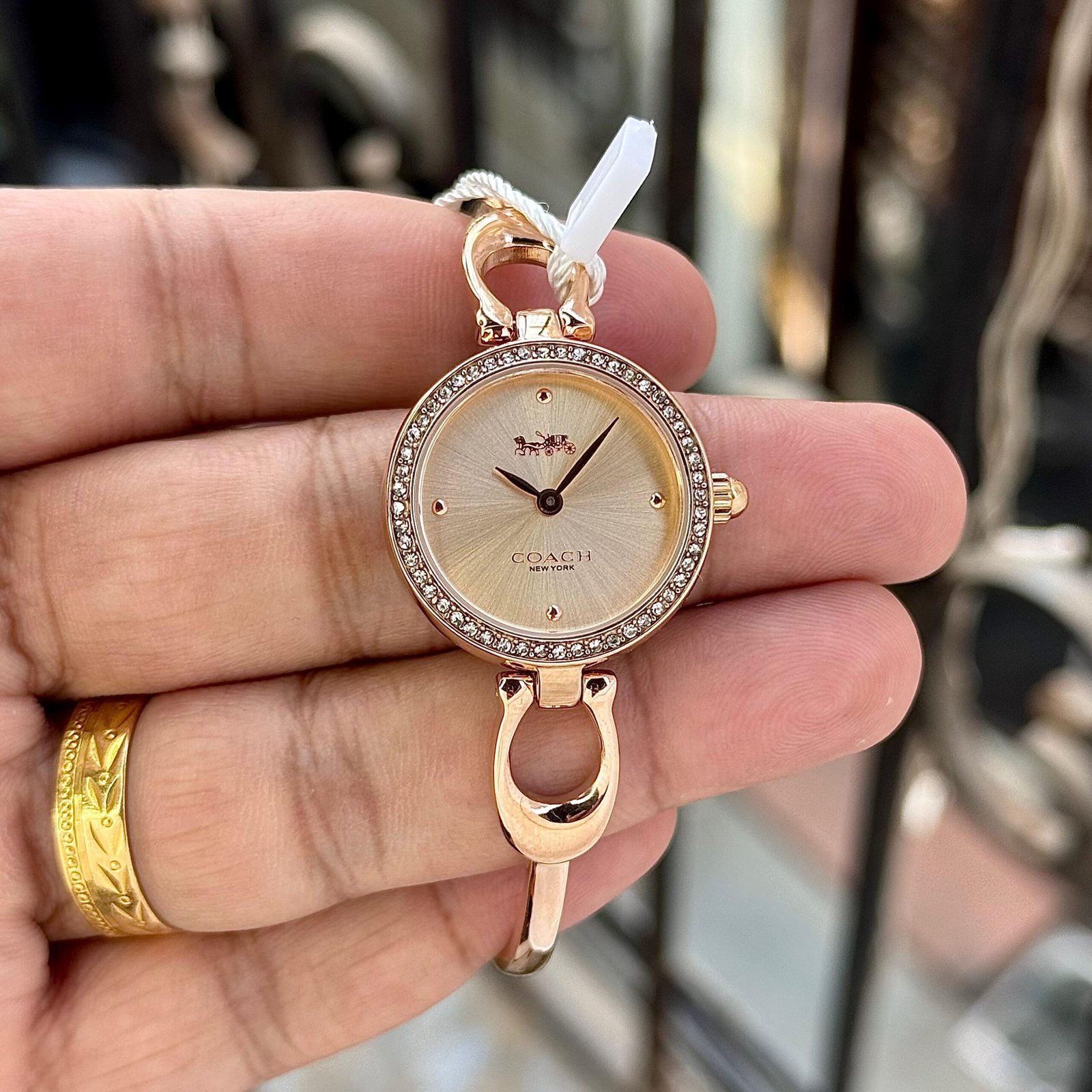 WhatsApp Image 2026-09-26 at 12.16.06 AM (1) Coach Champagne Rose Gold Dial - Image 1