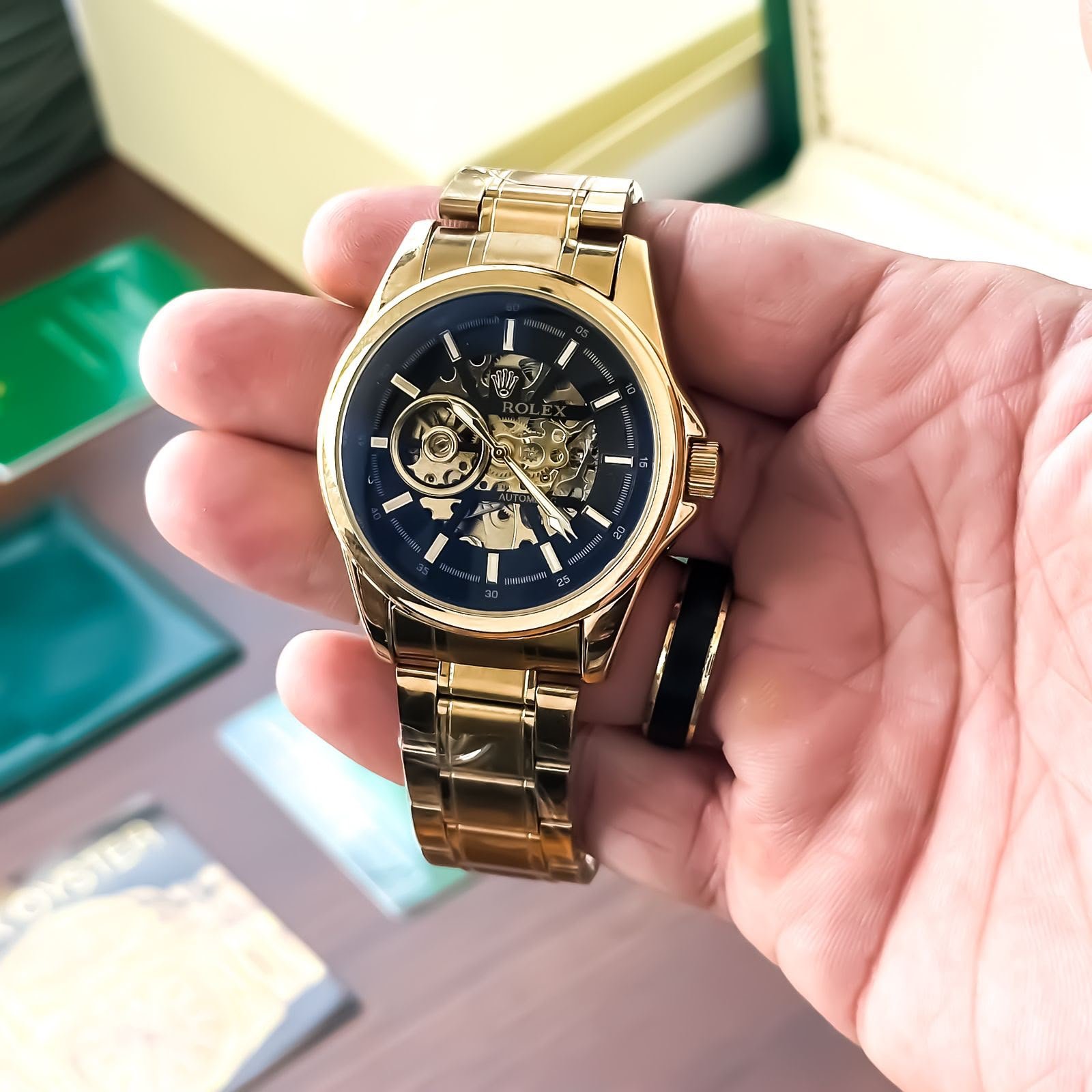 WhatsApp Image 2026-09-27 at 10.58.44 PM Rolex Gold Black Skeleton Dial Automatic - Image 1
